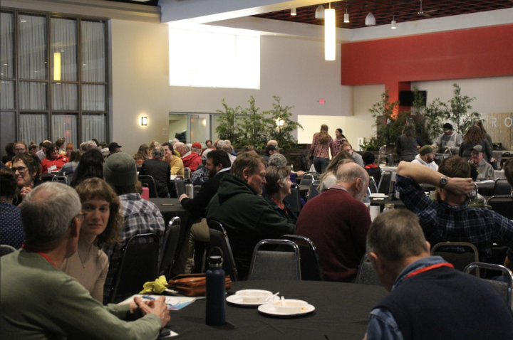 Group of people gathered at NSAS conference from 2024